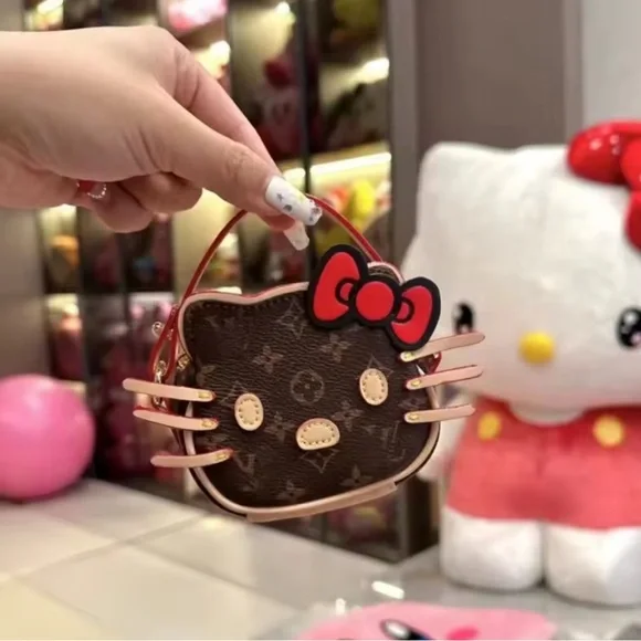 Hello Kitty Brown Monogram Mini Crossbody with Red Bow - Picture 2 of 4